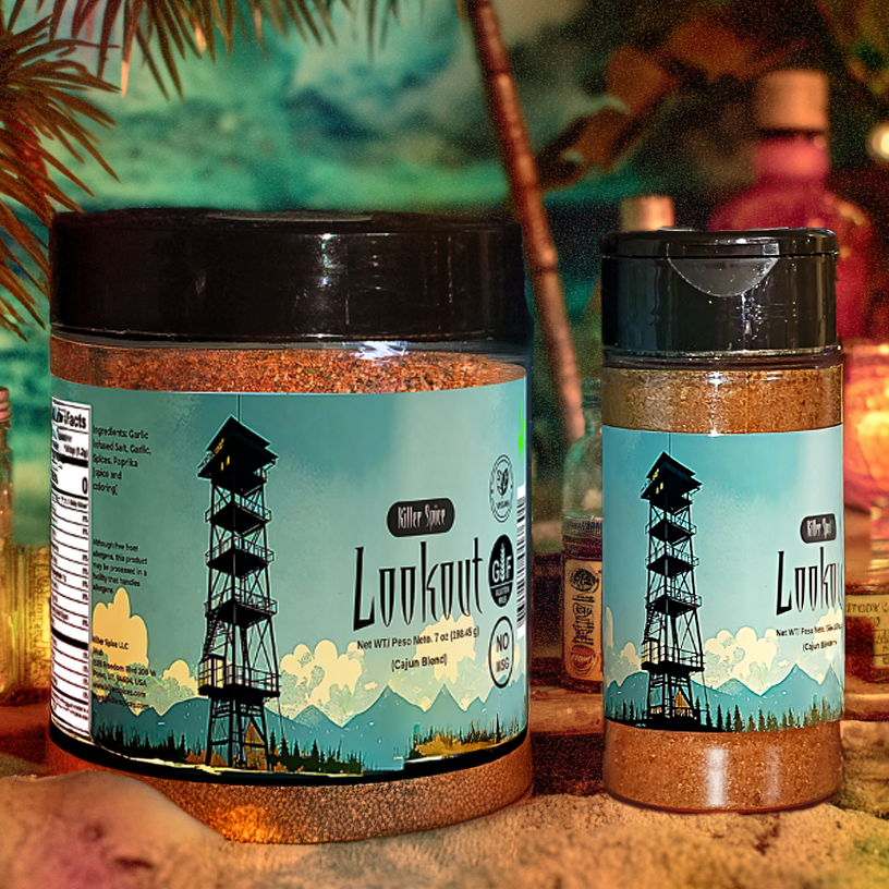 Two jars of 'Lookout' on a tropical-themed background with plants and candles.