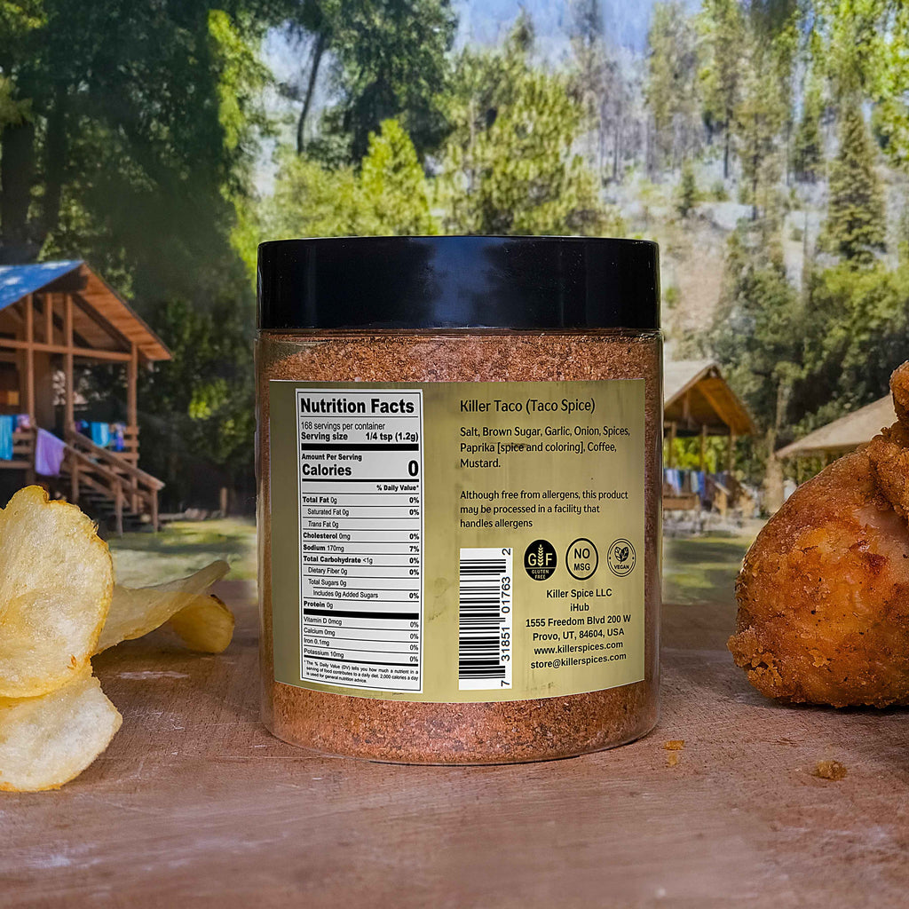 Killer Taco spice blend jar shown with nutrition label against outdoor background with potato chips